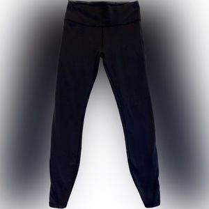 Black Lululemon Leggings with mesh detail on calves